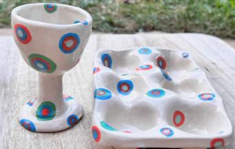 Hand-buillt and decorated Egg Cup and Egg holder