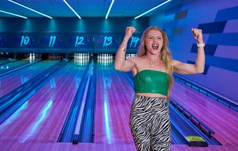 Lady at a bowling alley