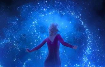 A dark blue background with magical swirls, the Princess is in the centre but facing away with her back to the viewer.