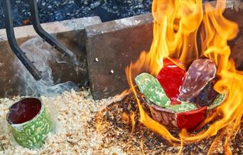 Raku being fired.