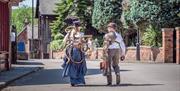 Steampunk festival attendees at Blists Hill Victorian Town wearing steampunk costumes