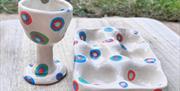 Hand-buillt and decorated Egg Cup and Egg holder