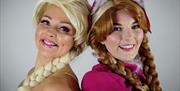 Ladies dressed up as Disney princess charactors