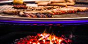 Bratwurst on the grill at Telford Christmas Market