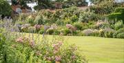 double tiered herbaceous borders in award winning garden at Goldstone