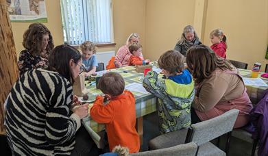 Familes crafting with natural materials