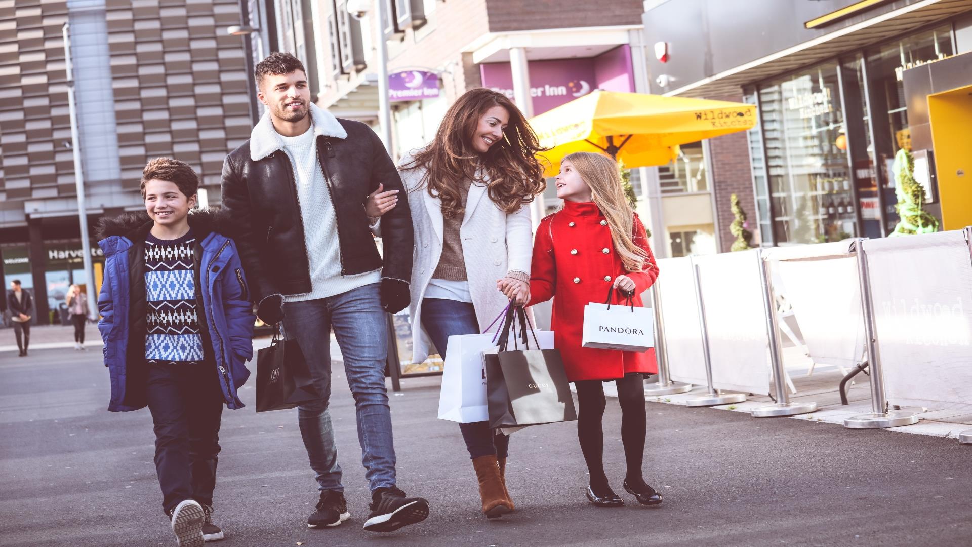 Family walking through shopping centre in Telford
