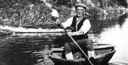 Harry Rogers in a coracle