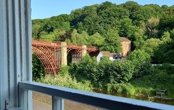 Stunning view of the first iron Bridge in the world, can be enjoyed from the comfy sofa at Ironbridge View Townhouse