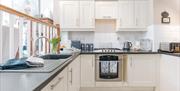 The kitchen at Ironbridge View Townhouse is fully equipped with everything you need, even a dishwasher!