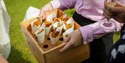 canapes being served at an outdoor event in the hotel garden