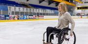 Beth Morgan a wheelchair user on the ice at Telford Ice RInk