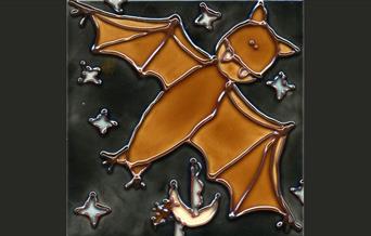 Cartoon Bat painted on a tile
