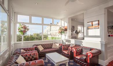 Chesterfield leather sofas at entrance to Birnbeck Suite