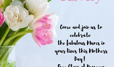 Mother's Day image with a photograph of tulips in a vase.