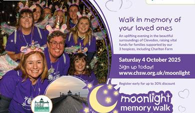 People smiling and in fancy dress at the Moonlight Memory Walk event