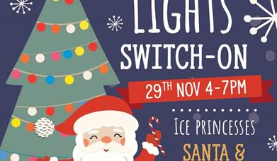 Poster featuring a Santa Claus and a Christmas tree promoting a Christmas lights switch on