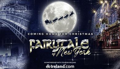 On the left is a snow covered bridge and buildings. On the right is a building covered in lights and the title is in the centre under a moon.