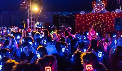 image of bright silent disco, with headphones