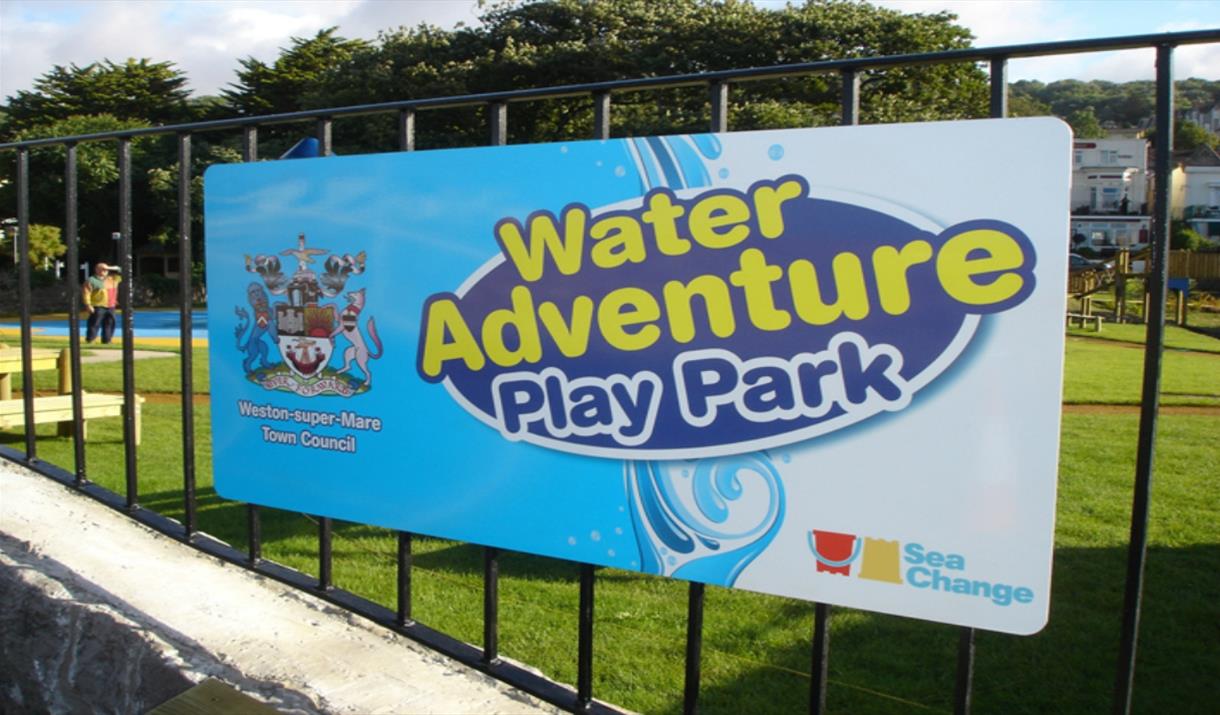 Sign on the railings saying Water Adventure Playpark