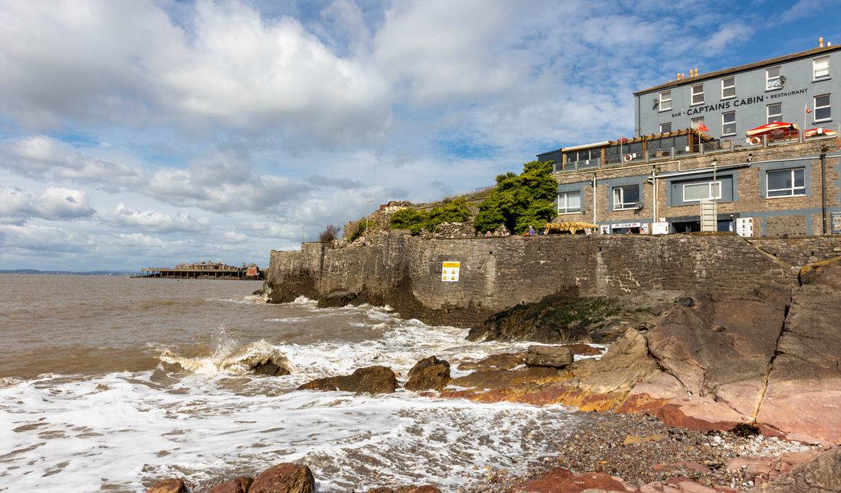 Captains Cabin pub and restaurant overlooking a rocky cove at Weston-super-Mare