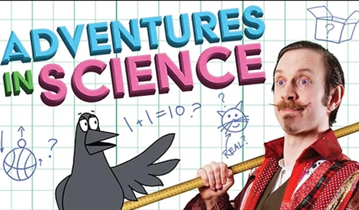 Picture of a scientist on graph paper with mathematical equations as well as a cartoon image of a cat and crow