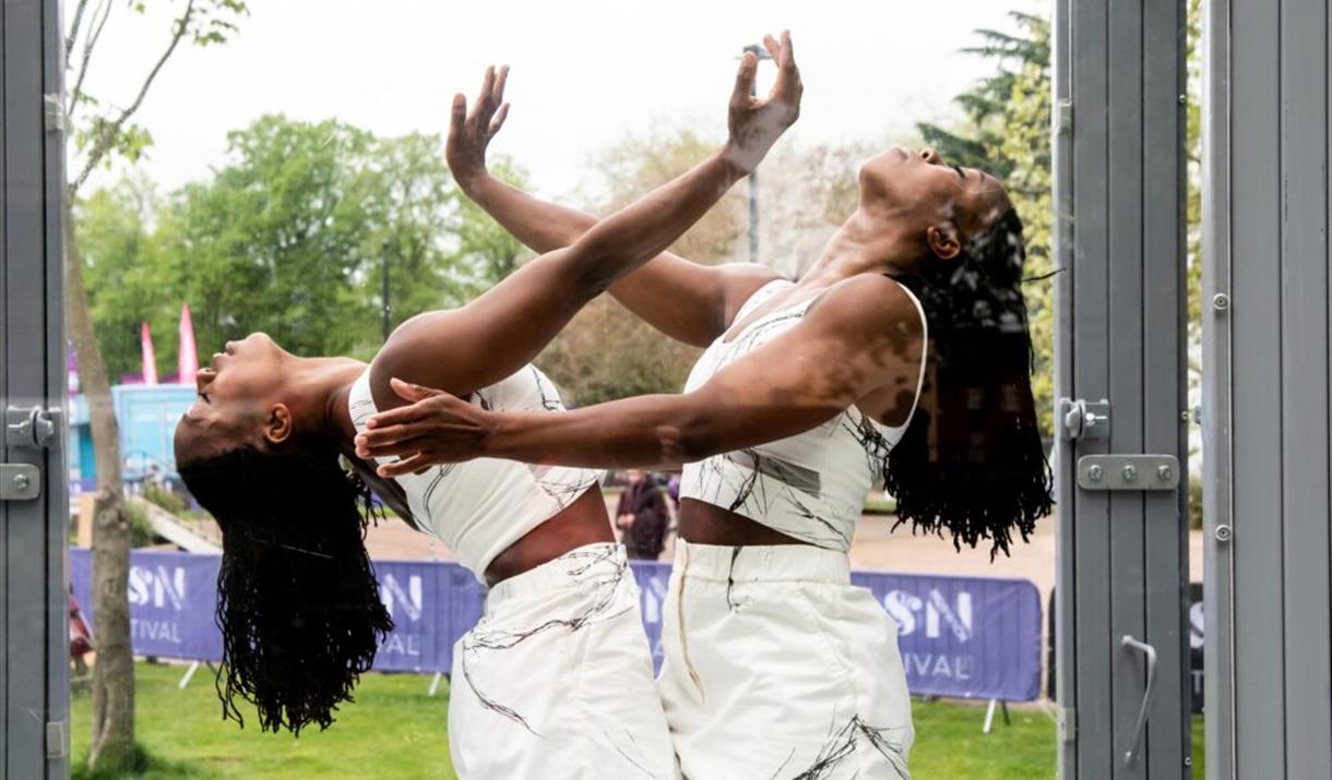 Photograph of twin dancers - bonded.