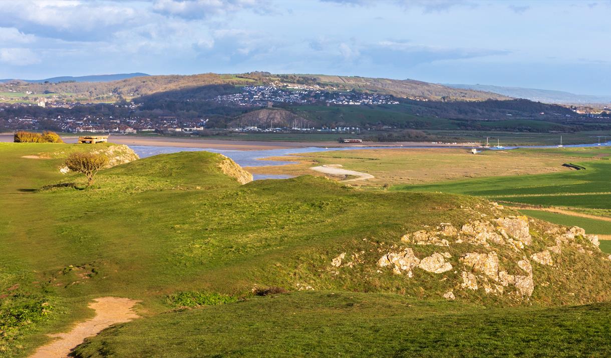 Scenic view from the top of Brean Down looking back over the summit of the Down and over the  estuary towards Bleadon