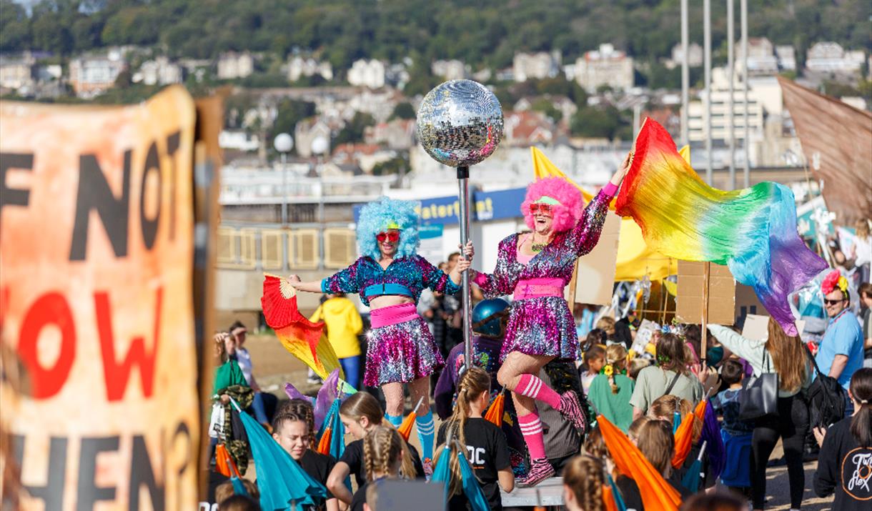 Bright photographs of carnival participants in costume.