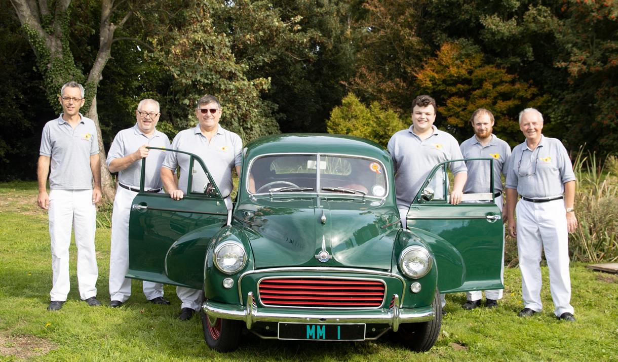 Morris Minor standing with a classic Morris Minor car