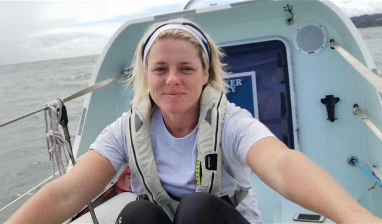 Photograph of Gemma Best, rowing in her boat.