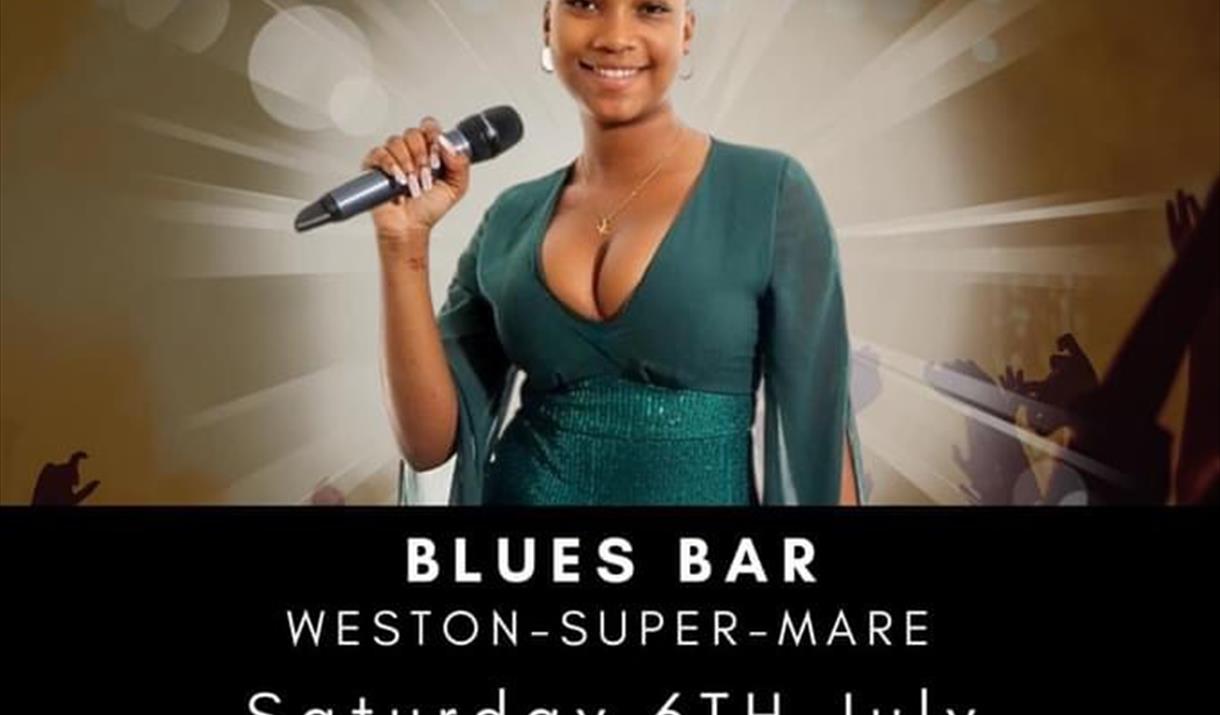 Photograph of Naya singing into a microphone with event details on the poster.