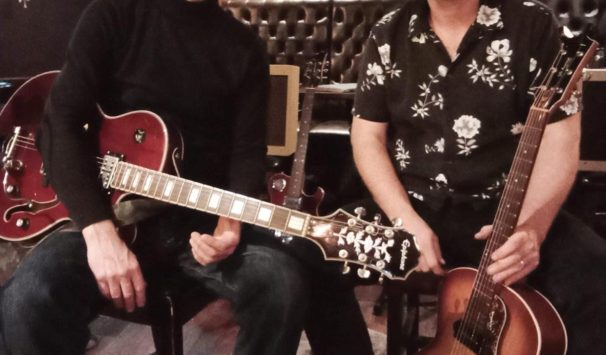 Photograph of The Bluesville band with guitars.