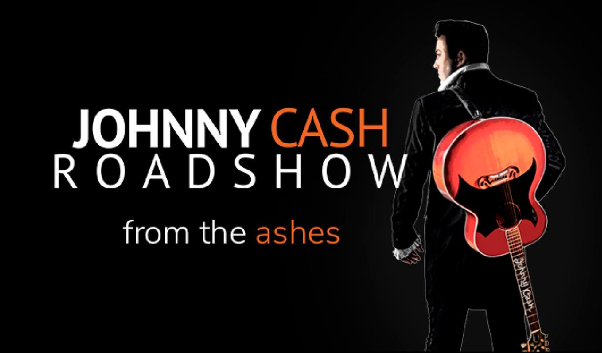 Johnny Cash with guitar from the rear