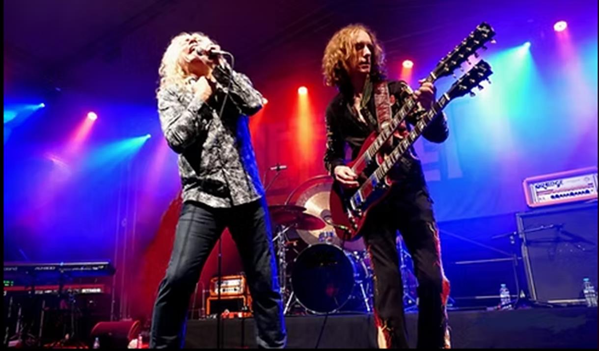 Two members of the Led Zeppelin tribute act Letz Zep  performing on stage