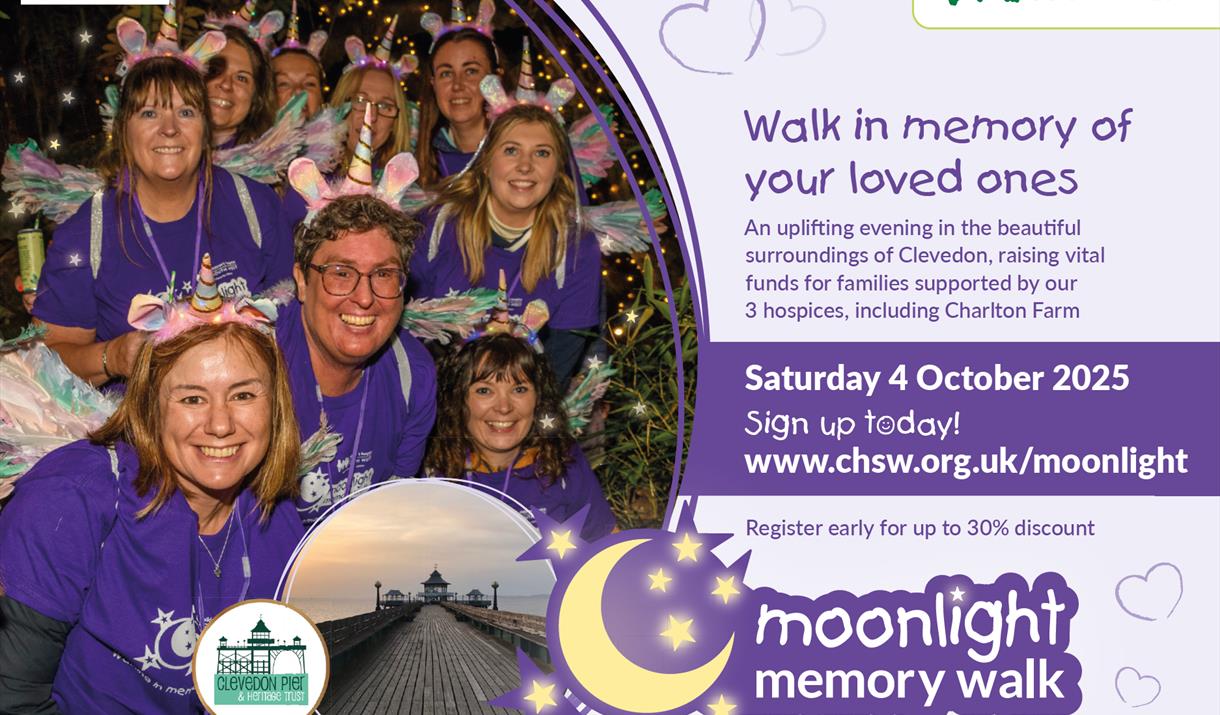 People smiling and in fancy dress at the Moonlight Memory Walk event