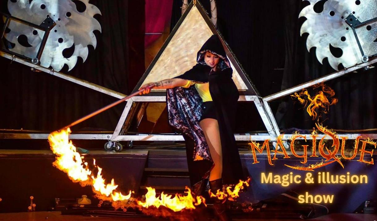 Magique at Wookey Hole - photograph of a fire artist.
