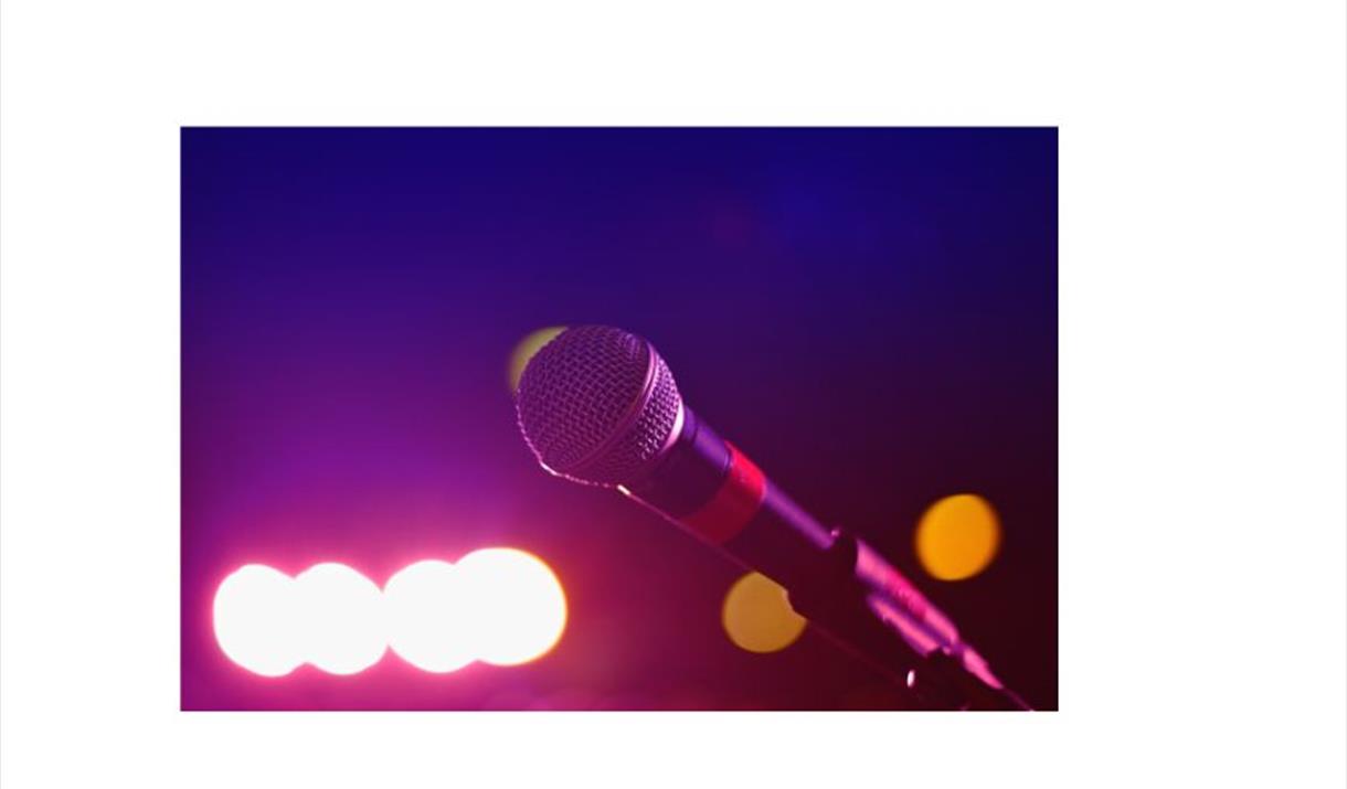 image of a microphone on a purple background