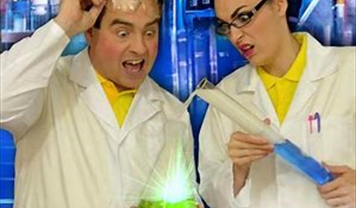 scientists over experiment, shocked expressions