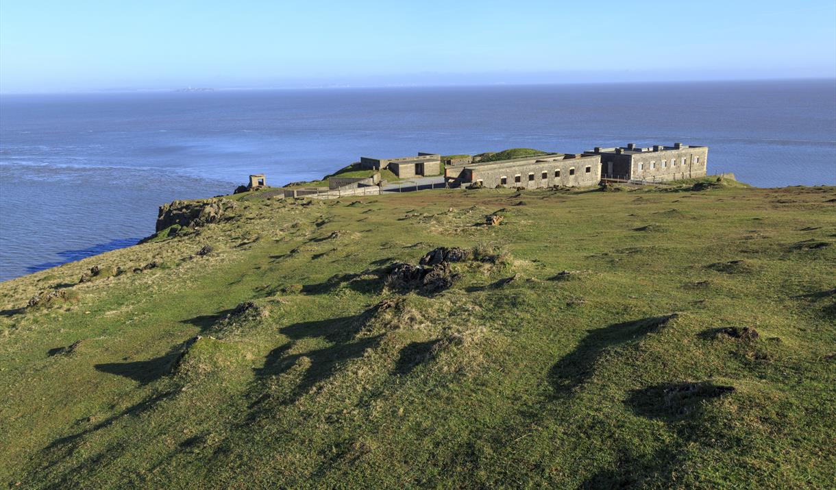 A disused World World Two fort at the end of a coastal peninsula.