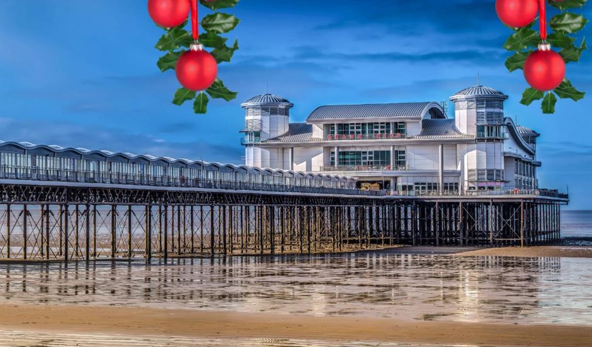 View of a seaside pier with some Christmas decorations overlaid