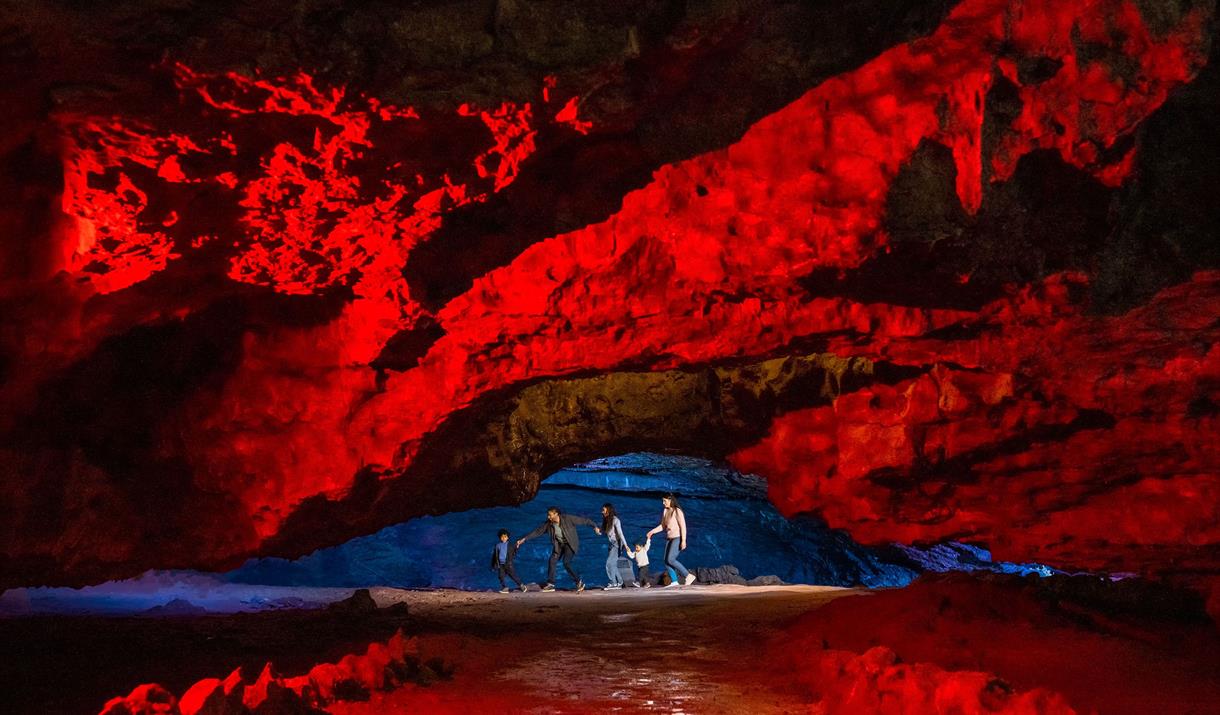 Summer memories made at Wookey Hole - photograph of the caves with red lights.