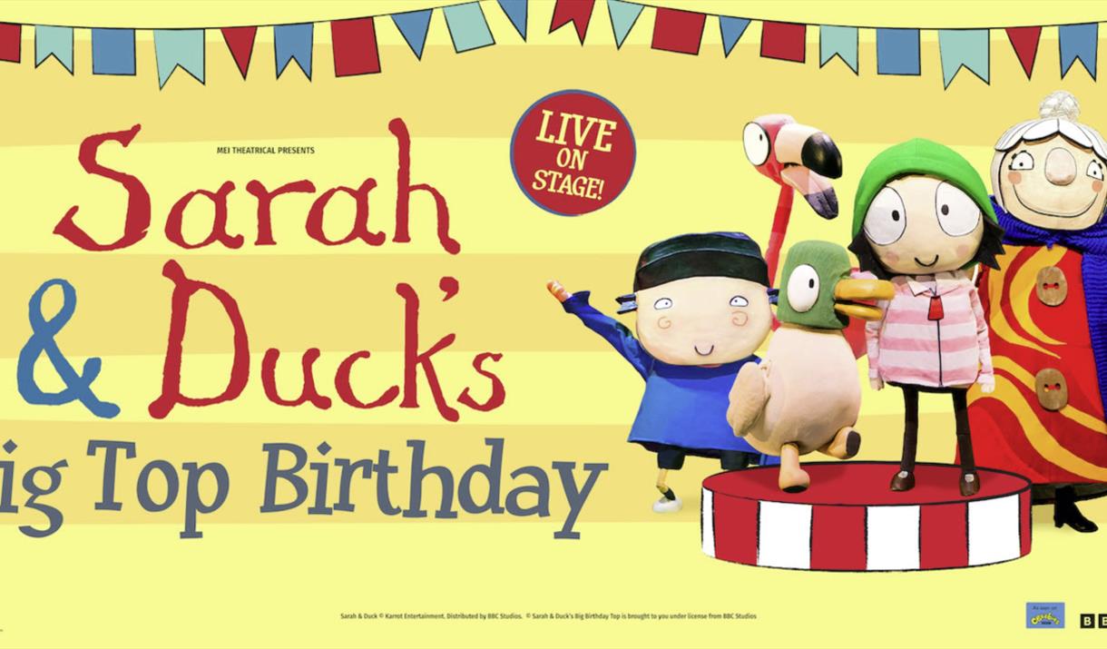 The characters on the right and the title in red and two shades of blue on the left.