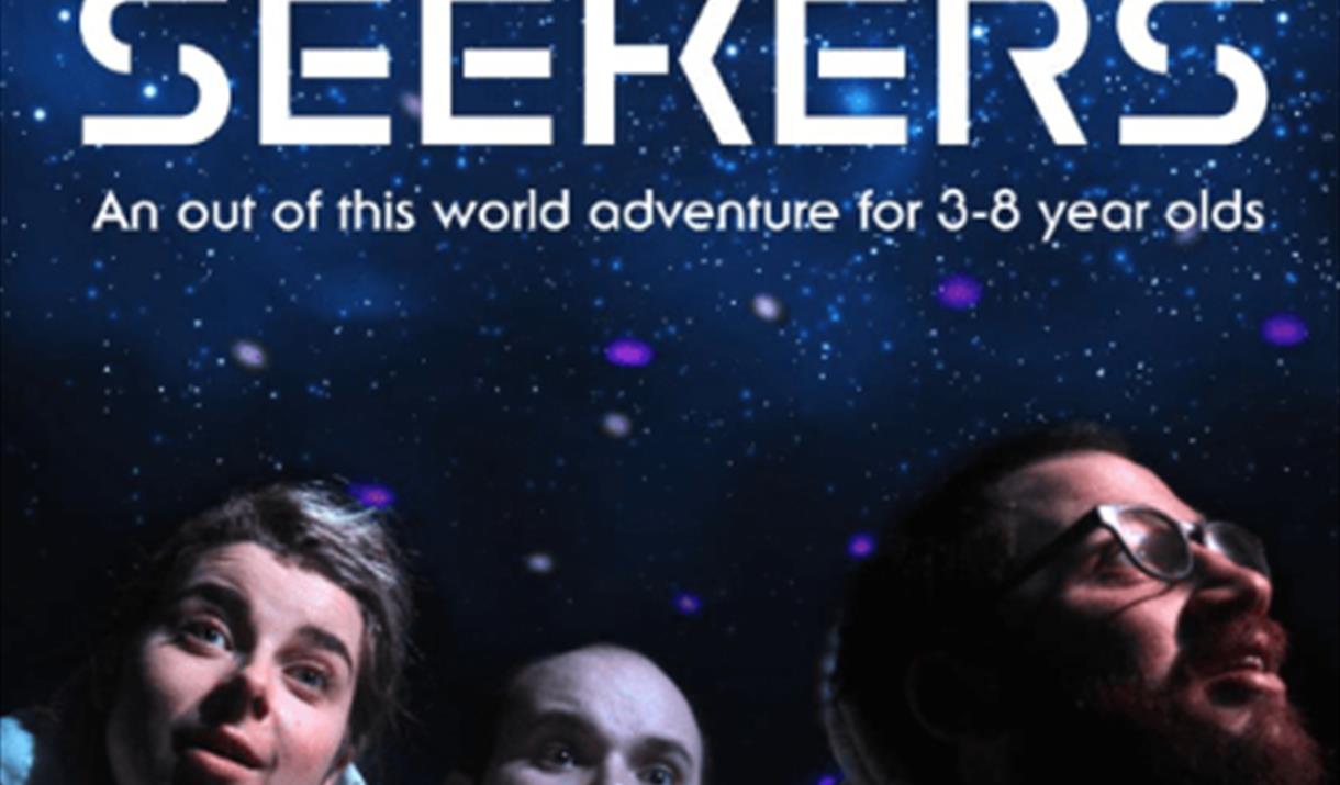 Photograph of star seekers with lots of stars in the background.
