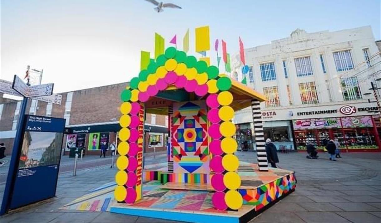 Photograph of the brightly coloured Super Wonder Shrine