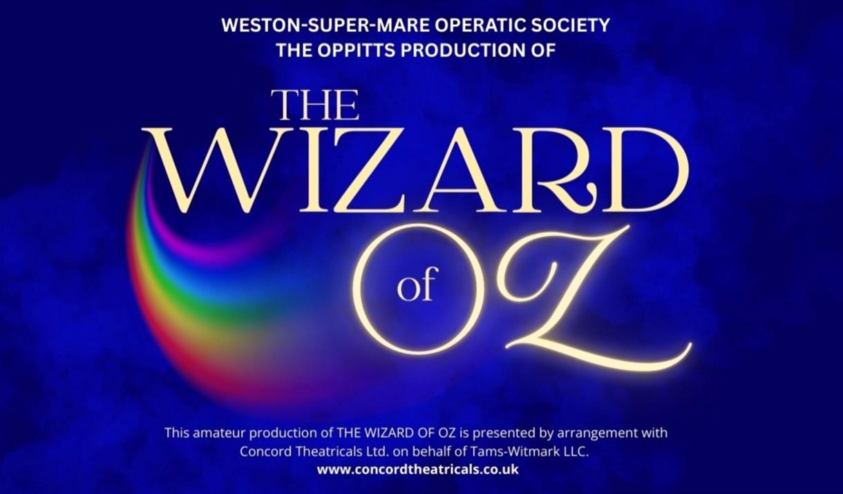 Poster featuring rainbow colours under the words Wizard of Oz