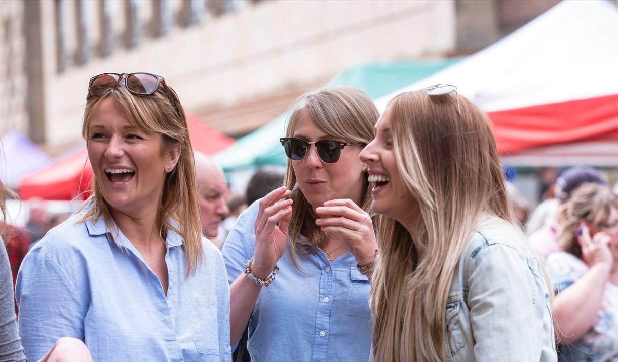 Happy people at an eat:Festivals event