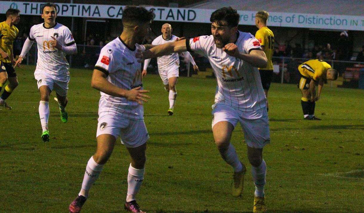 A footballer punching the air