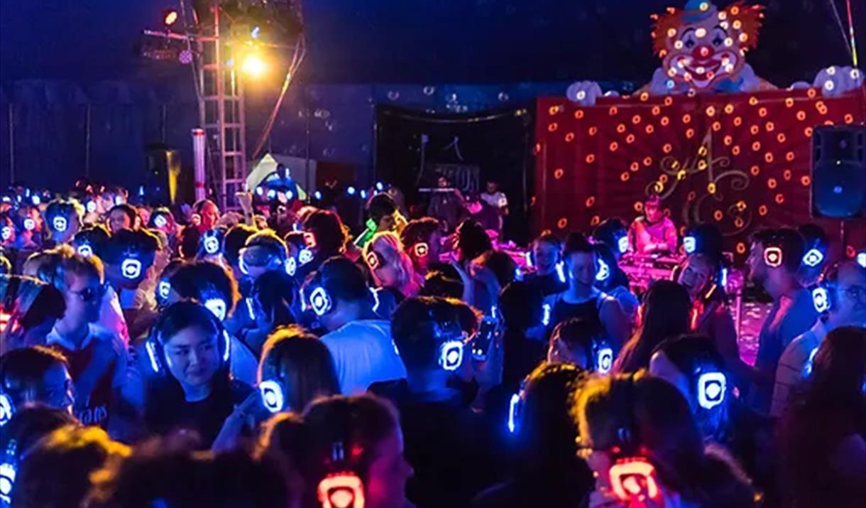 image of bright silent disco, with headphones