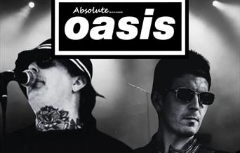 Black and white photo of two members of the Absolute Oasis tribute band performing